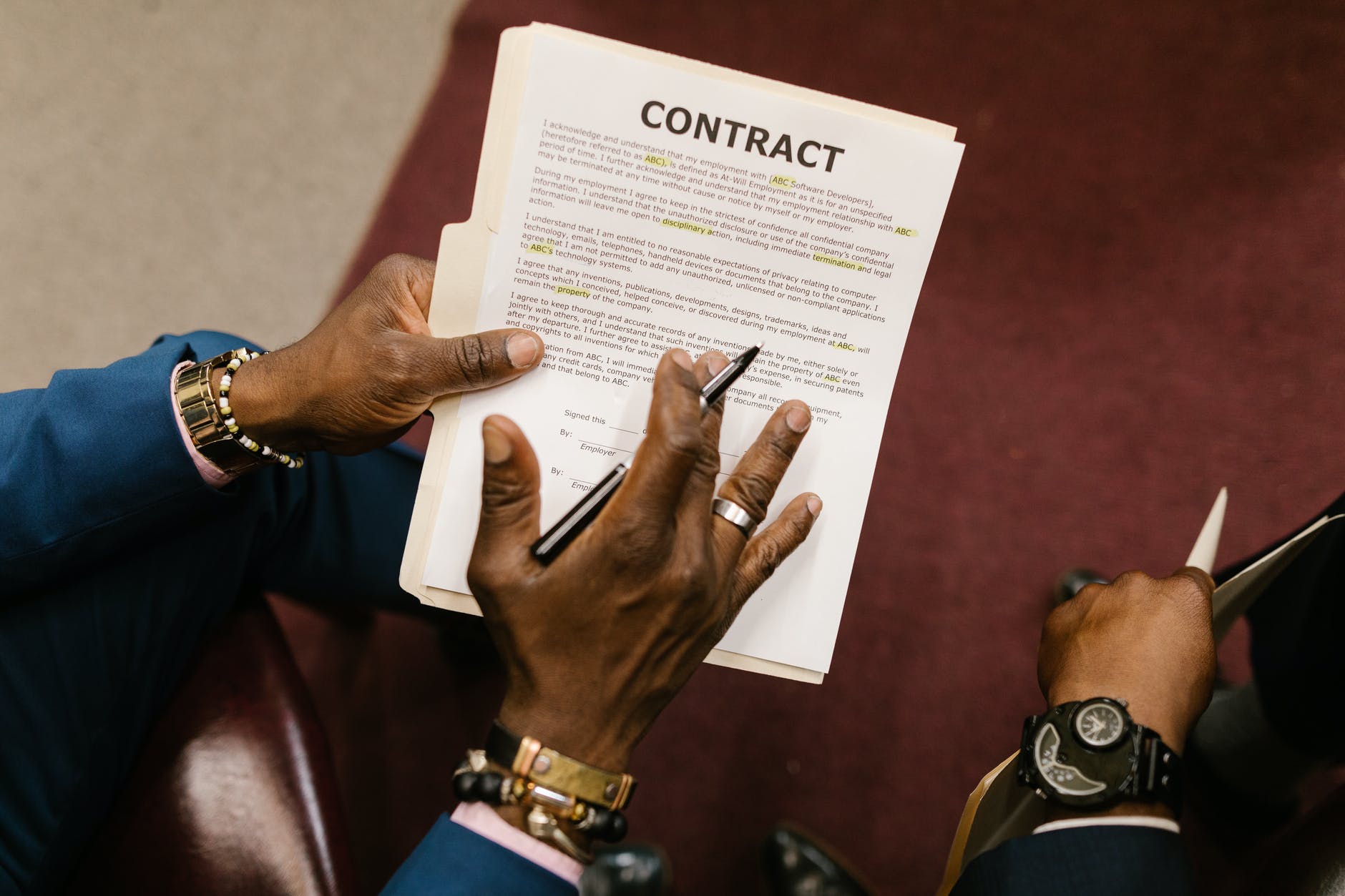 person holding white printer paper